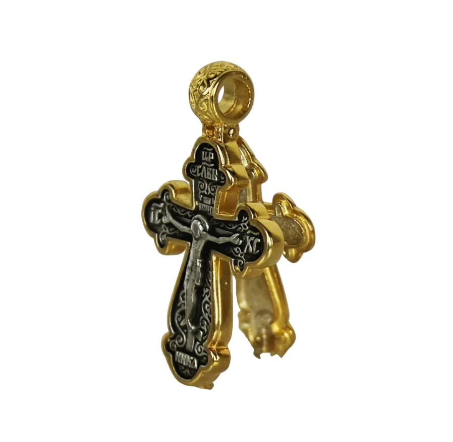 Silver Cross 925o Russian style that opens to place holy relics or holy unction. The front side bears the Crucified and the back side is decorated.  Dimensions: 2,8 x 3,4 cm.